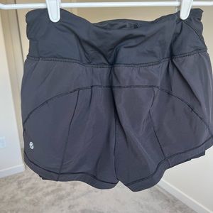 Lululemon black shorts with built in spandex 4”
